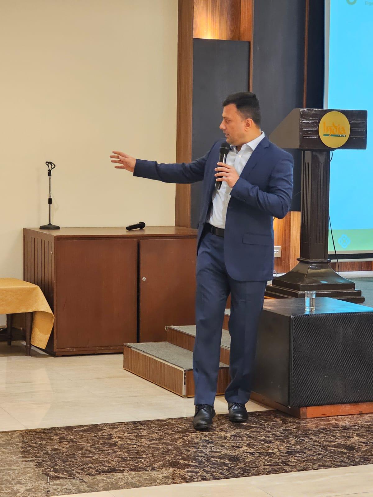 Dr. Vinod Hegade speaking on fatty liver and colon cancer awareness at India Club Dubai