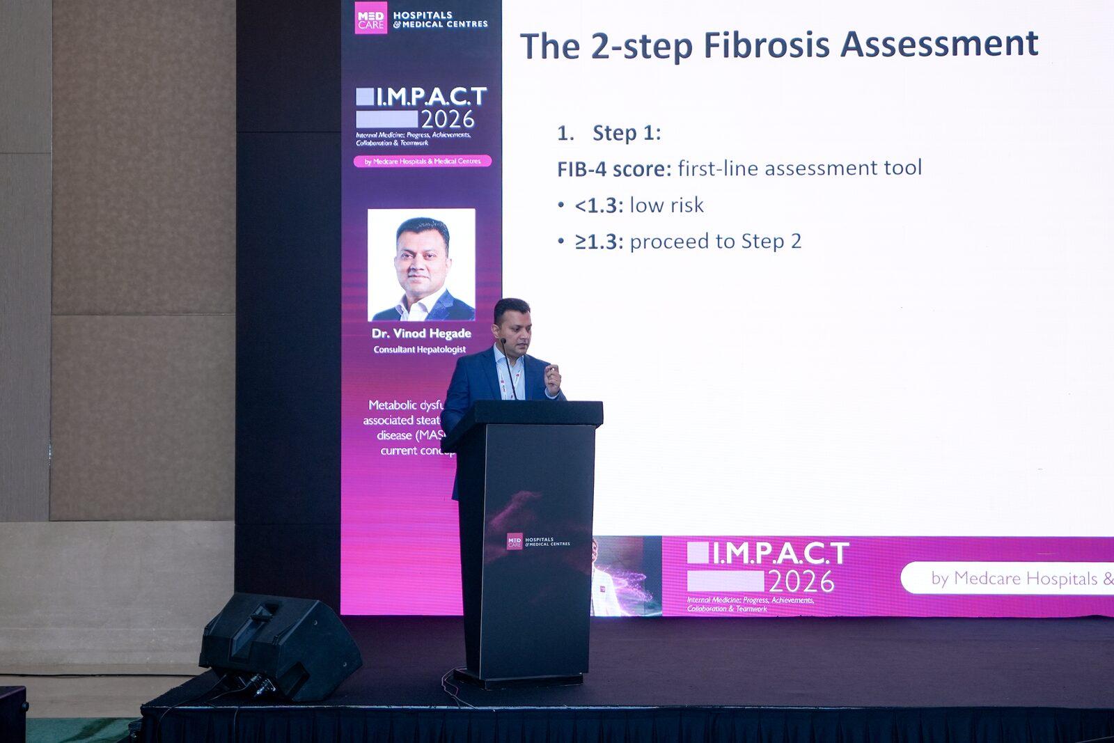 Dr. Vinod Hegade explaining the FIB-4 score for MASLD fibrosis screening at IMPACT 2026