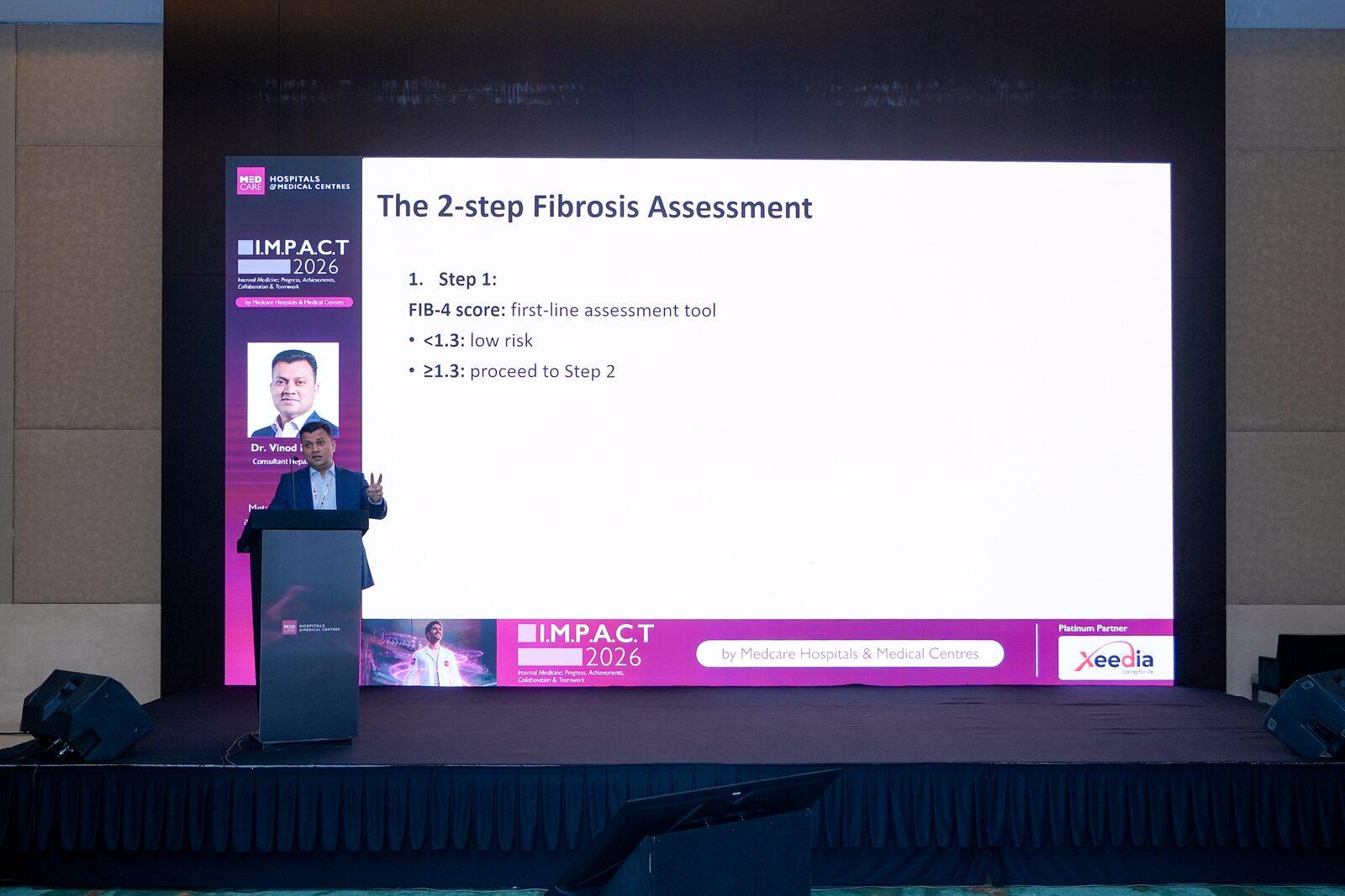 Dr. Vinod Hegade presenting the 2-step fibrosis assessment at IMPACT 2026