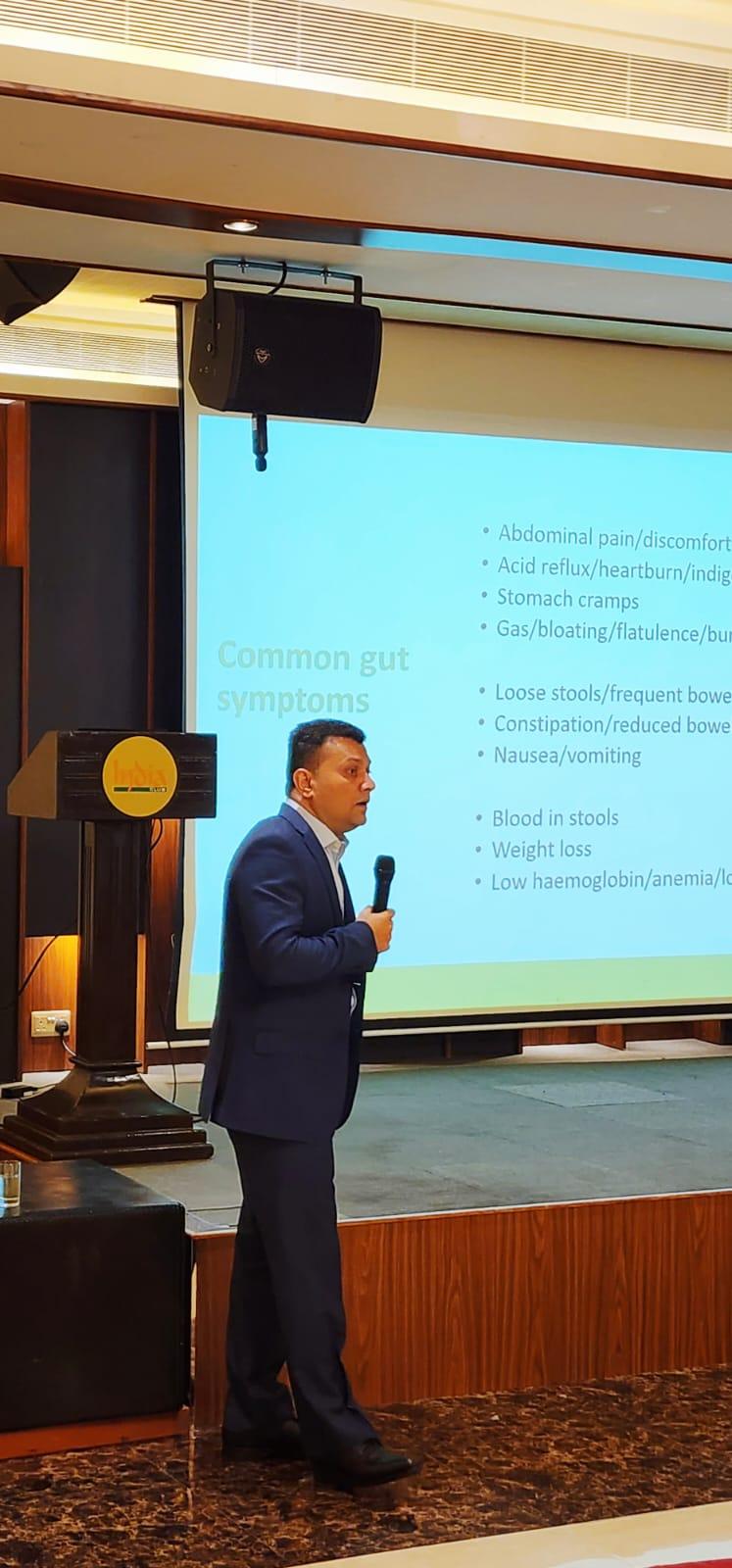 Dr. Vinod Hegade delivering a gut health talk to India Club members in Dubai
