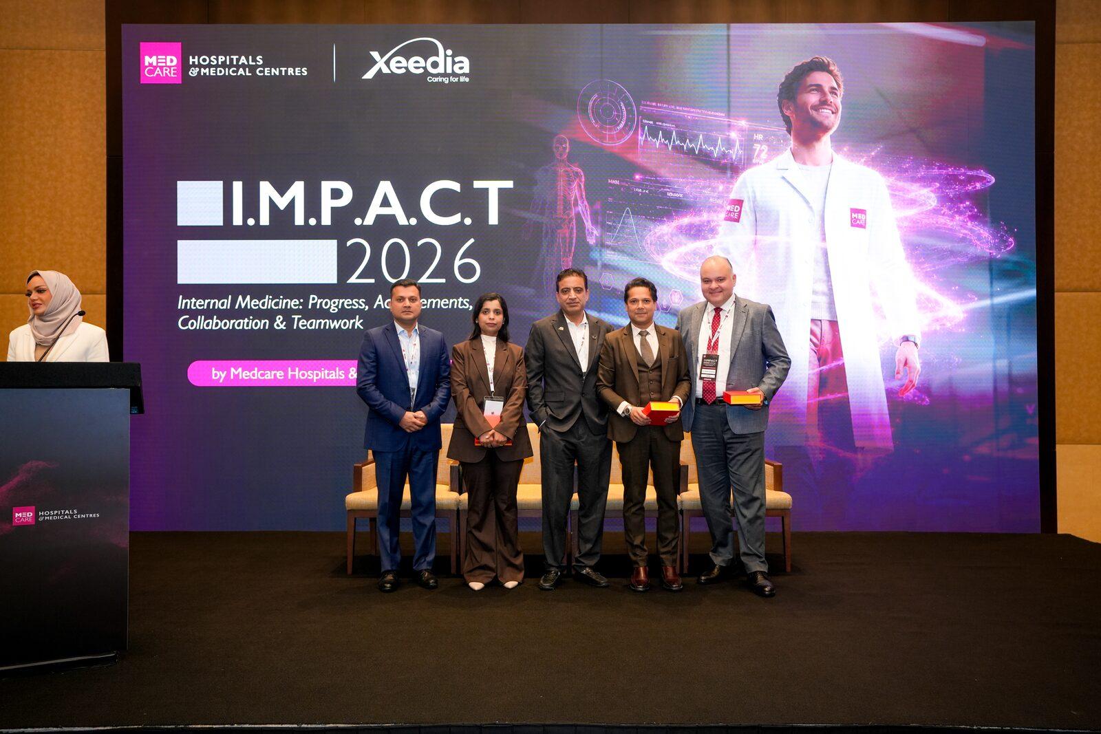 Dr. Vinod Hegade with IMPACT 2026 conference faculty, Medcare Hospitals & Medical Centres